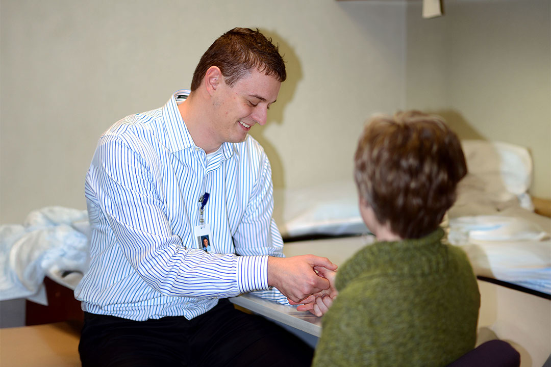 Therapist working with patient